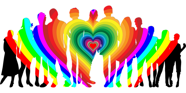 silhouette of different people with a rainbow heart
